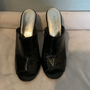 Black dressy sandals.